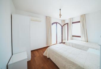 Gorgeous Mansion with Breathtaking Sea View, pool and Jacuzzi has rooms with a private hot tub