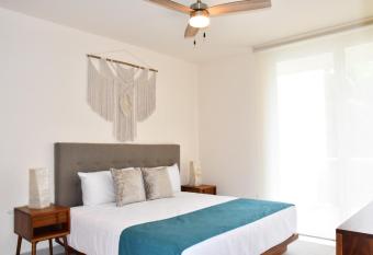 Luxury Bedroom Santamar By The Spot Rentals has Balcony rooms