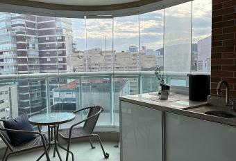 Estanconfor Praia Santos 3 - AC garagem arruma    o sacada fechada has Balcony rooms