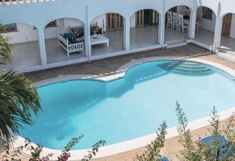 Intimate beach front Villa in Diani Centre allows 18 year olds to book a room