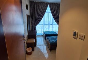 Ajman Cornish Residence has rooms with a private hot tub