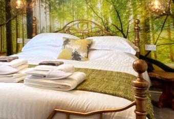 Luxury tree-house with optional spa tub has rooms with a private hot tub