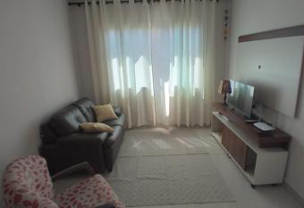 Casa aconchegante com piscina e bem localizada has Balcony rooms