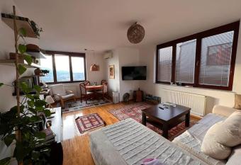 Spacious comfortable flat with splendid view has rooms with a private hot tub