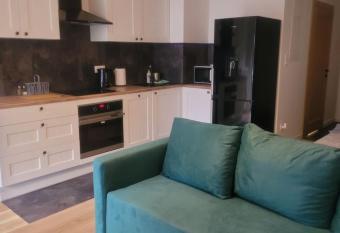 Nowy apartament z parkingiem przy centrum allows 18 year olds to book a room