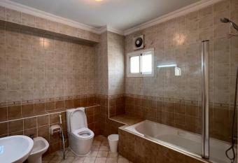 Master bedroom with entertaining facilities & Swimming pool has rooms with a private hot tub