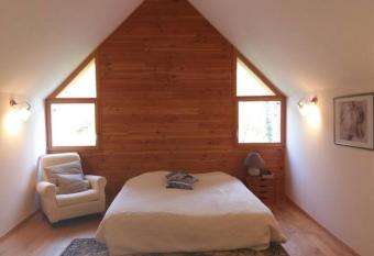 Une chambre dans un cottage chaleureux has Balcony rooms