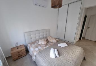 AGORA LUXURY APARTMENT 1 has rooms with a private hot tub