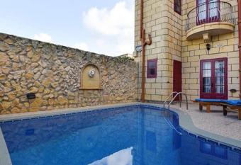 Four bedroom air-conditioned Farmhouse with Pool and BBQ has Balcony rooms