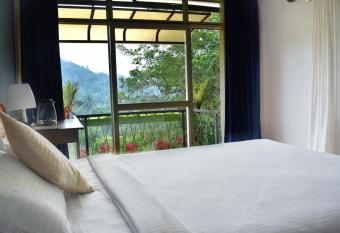 Raymond s Holiday Homes has Balcony rooms