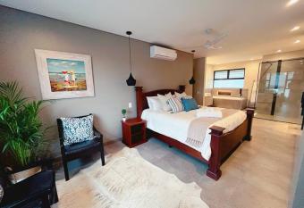 Modern 3-bedroom home walking distance from Beach has Balcony rooms