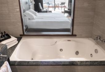 Hotel Can Xiquet has rooms with a private hot tub