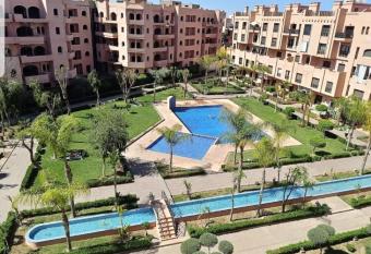 un moderne chic appartement vue sur piscine has rooms with a private hot tub