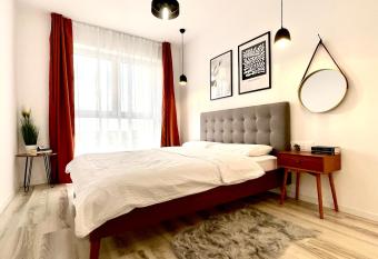 Sunset View Apartment has rooms with a private hot tub