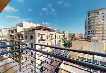 Spacious 2 bedroom apartment in Sliema allows 18 year olds to book a room