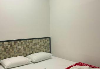 Apartahotel El paraiso has rooms with a private hot tub