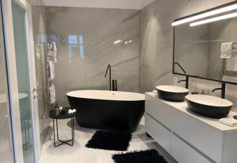 Schillerplatz Apartment has rooms with a private hot tub