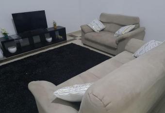 Lovely 1 Bedroom Condo Close to Airport has rooms with a private hot tub