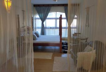 Churrey Beach front Studio with pool allows 18 year olds to book a room