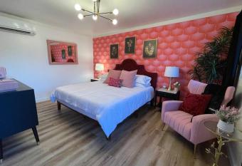 Pretty N Pink Room At The Groovy Nomad Motel has Balcony rooms