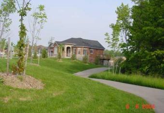 Charming custom home beside park, walk to beach has Balcony rooms