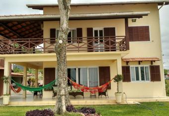 F  rias e alegrias em casa p   na areia! has Balcony rooms