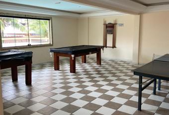 Apto Vila Tupi duas quadras da praia has Balcony rooms