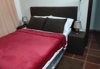 Peque  o departamento allows 18 year olds to book a room