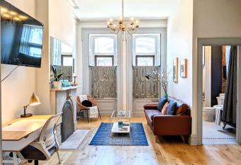 HostWise Stays - Industrial Vintage Style, Close to Downtown! allows 18 year olds to book a room