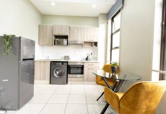 Contemporary Studio Apt w/Cinema allows 18 year olds to book a room