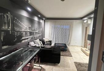 Retro Chic 2BR Apartment with patio in a world class compound Madinty has Balcony rooms