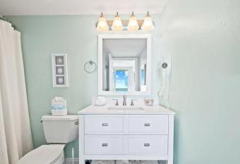 Beachfront Retreat-  has rooms with a private hot tub