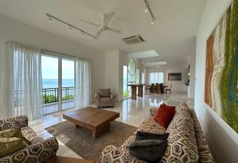 Panoramic Seaview Holiday Home - Batu Ferringhi has Balcony rooms