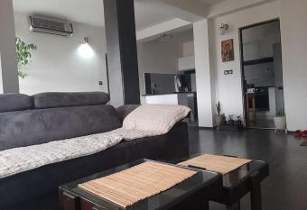 Apartment #7 has rooms with a private hot tub