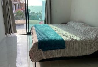 Departamento a media cuadra del malec  n has Balcony rooms