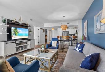 9th floor 2BR 2 BATH King Suite Beach shuttle, heated pool! has rooms with a private hot tub