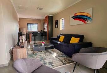 Modern 2 bedroom at Waterfall Ridge-Midrand has rooms with a private hot tub