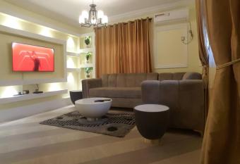Lavishly furnished, fully air-conditioned 3 bed apartment in a lively part of town close to MM International Airport 24hrs power supply with free WiFi allows 18 year olds to book a room