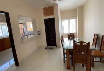 4 Beds Holiday Condo Home in Dhaka has rooms with a private hot tub