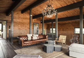 Lax   Lodge has rooms with a private hot tub