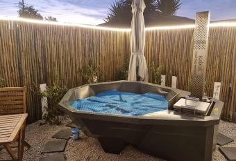 Villa Millettia has rooms with a private hot tub