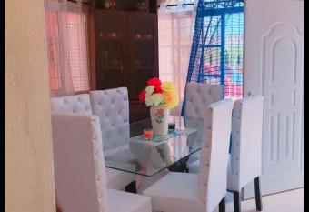 House With Pool 5 Min To The Airport Las Americas has Balcony rooms