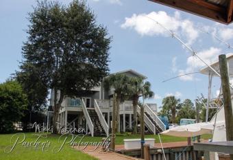 Private Waterfront Home and Venue w/ Private Docks, Boat Rental, and Charter service has Balcony rooms