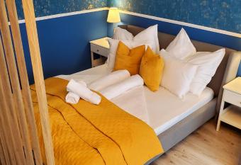 DN Blue Apartment has rooms with a private hot tub