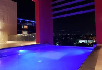 Infinity Pool Paradise Vacation Home has Balcony rooms