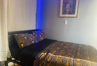 Double-Mirrored Glass Room in Queens has Balcony rooms