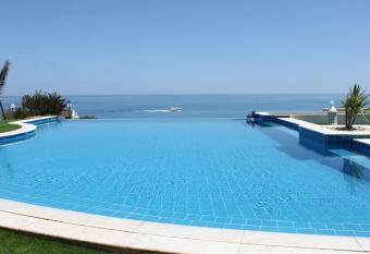 Breathtaking villa with infinity pool over the sea has Balcony rooms