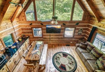 Log Cabin W/ King Bed, Covered Parking and Arcade! has Balcony rooms