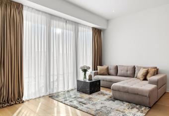 ONE Tower Apartments has rooms with a private hot tub