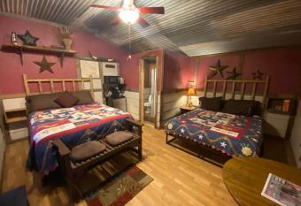 Cozy Frontier Theme Suite 1890 Cattle & Land Office allows 18 year olds to book a room